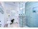 Modern bathroom with a walk-in shower and tiled walls at 811 W Hiawatha St, Tampa, FL 33604