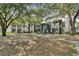 Community view with green space and building exteriors at 8517 Island Breeze Ln # 207, Temple Terrace, FL 33637