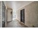 Interior hallway with doors to individual units at 8517 Island Breeze Ln # 207, Temple Terrace, FL 33637