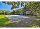 Outdoor sand volleyball court nestled among trees at 8517 Island Breeze Ln # 207, Temple Terrace, FL 33637