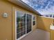 Balcony access with sliding glass doors at 8958 White Sage Loop, Lakewood Ranch, FL 34202