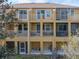 Back exterior view of a townhome with balconies at 8958 White Sage Loop, Lakewood Ranch, FL 34202