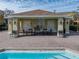 Community pool area with covered seating and restrooms at 8958 White Sage Loop, Lakewood Ranch, FL 34202