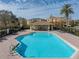 Inviting community pool with lounge chairs and a cabana at 8958 White Sage Loop, Lakewood Ranch, FL 34202