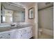 Clean bathroom with vanity, toilet and bathtub at 9 Haig Pl # 707, Dunedin, FL 34698