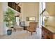 Lobby with seating area and tropical plants at 9 Haig Pl # 707, Dunedin, FL 34698