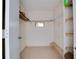 Large walk-in closet with wire shelving at 9 Haig Pl # 707, Dunedin, FL 34698
