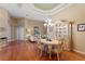 Elegant dining room with hardwood floors and a tray ceiling at 10109 Kingshyre Way, Tampa, FL 33647