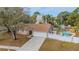 Single-story home with pool and fenced backyard at 102 Shoreview Ln, Oldsmar, FL 34677