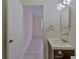 Small bathroom with a vanity and access to bedroom at 102 Shoreview Ln, Oldsmar, FL 34677