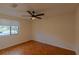 Bedroom with laminate wood floor and ceiling fan at 102 Shoreview Ln, Oldsmar, FL 34677