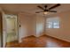 Bedroom with laminate wood floor and ceiling fan at 102 Shoreview Ln, Oldsmar, FL 34677