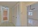 Bright hallway with tile flooring and access to other rooms at 102 Shoreview Ln, Oldsmar, FL 34677
