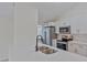 Modern white kitchen with stainless steel appliances at 102 Shoreview Ln, Oldsmar, FL 34677