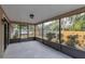 Spacious screened porch overlooking backyard at 102 Shoreview Ln, Oldsmar, FL 34677