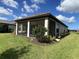 Screened patio with lush landscaping at 10912 Wicker Park Pl, Palmetto, FL 34221