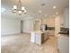 Open concept kitchen with a large island and modern finishes at 10912 Wicker Park Pl, Palmetto, FL 34221