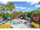 Inviting spa with seating and landscaping at 10912 Wicker Park Pl, Palmetto, FL 34221