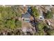 Aerial view showcasing the house, pool, and surrounding landscape at 12575 Maleo Rd, Weeki Wachee, FL 34614