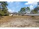 Expansive backyard offering privacy and potential at 12575 Maleo Rd, Weeki Wachee, FL 34614