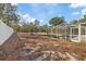 Large backyard with a fenced perimeter and pool at 12575 Maleo Rd, Weeki Wachee, FL 34614
