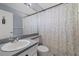 Simple bathroom with shower, toilet, and vanity at 12575 Maleo Rd, Weeki Wachee, FL 34614