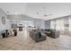 Spacious living room with tile flooring, an open layout, and large windows at 12575 Maleo Rd, Weeki Wachee, FL 34614