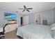 Large main bedroom with a king-size bed and ensuite bath at 12575 Maleo Rd, Weeki Wachee, FL 34614