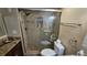 Updated bathroom with granite vanity, large shower, and tiled floors at 18325 Gulf Blvd # 407, Redington Shores, FL 33708