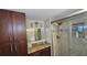 Updated bathroom with granite vanity, large shower, and tiled floors at 18325 Gulf Blvd # 407, Redington Shores, FL 33708