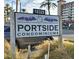 Portside Condominiums sign with building in background at 18325 Gulf Blvd # 407, Redington Shores, FL 33708