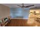 Light and airy dining area with hardwood floors and view of kitchen at 18325 Gulf Blvd # 407, Redington Shores, FL 33708