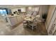 Kitchen dining area features a round table with four chairs at 18325 Gulf Blvd # 407, Redington Shores, FL 33708
