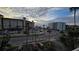 View of the street, parking lots and neighboring buildings at 18325 Gulf Blvd # 407, Redington Shores, FL 33708