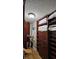 Spacious walk-in closet with shelving, drawers, and hanging space at 18325 Gulf Blvd # 407, Redington Shores, FL 33708