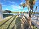 Enjoy waterfront views from this relaxing patio area with a picnic table at 18325 Gulf Blvd # 407, Redington Shores, FL 33708