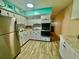 Modern kitchen with stainless steel appliances at 2002 Australia E Way # 38, Clearwater, FL 33763