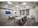 U-shaped conference table with chairs in a modern room at 20108 Sea Glass Cir, Land O Lakes, FL 34638