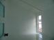 Spacious bedroom with large window and marble-look floors at 214 W 109Th Ave, Tampa, FL 33612