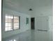 Bright living room with white walls and shiny floors at 214 W 109Th Ave, Tampa, FL 33612