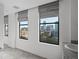Modern bathroom with city views and large windows at 226 5Th N Ave # 1106, St Petersburg, FL 33701