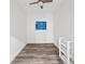 Bright bedroom with ceiling fan and gray flooring at 226 5Th N Ave # 1106, St Petersburg, FL 33701