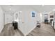 Bright entryway with wood-look floors, leading to living and dining areas at 226 5Th N Ave # 1106, St Petersburg, FL 33701