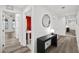 Bright hallway with modern flooring and half bath at 226 5Th N Ave # 1106, St Petersburg, FL 33701