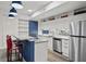 Modern kitchen with granite countertops and stainless steel appliances at 226 5Th N Ave # 1106, St Petersburg, FL 33701