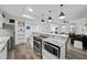 Open kitchen with granite counters, stainless steel appliances, and breakfast bar at 226 5Th N Ave # 1106, St Petersburg, FL 33701