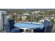 Enjoy city views from this rooftop balcony with a table and chairs at 226 5Th N Ave # 1106, St Petersburg, FL 33701