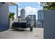 Upscale rooftop patio furniture with stunning city skyline views at 226 5Th N Ave # 1106, St Petersburg, FL 33701