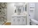 Clean bathroom with white vanity and walk-in shower at 2267 Heron Cir, Clearwater, FL 33762