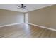 Spacious bedroom with light walls and wood-look flooring at 2267 Heron Cir, Clearwater, FL 33762